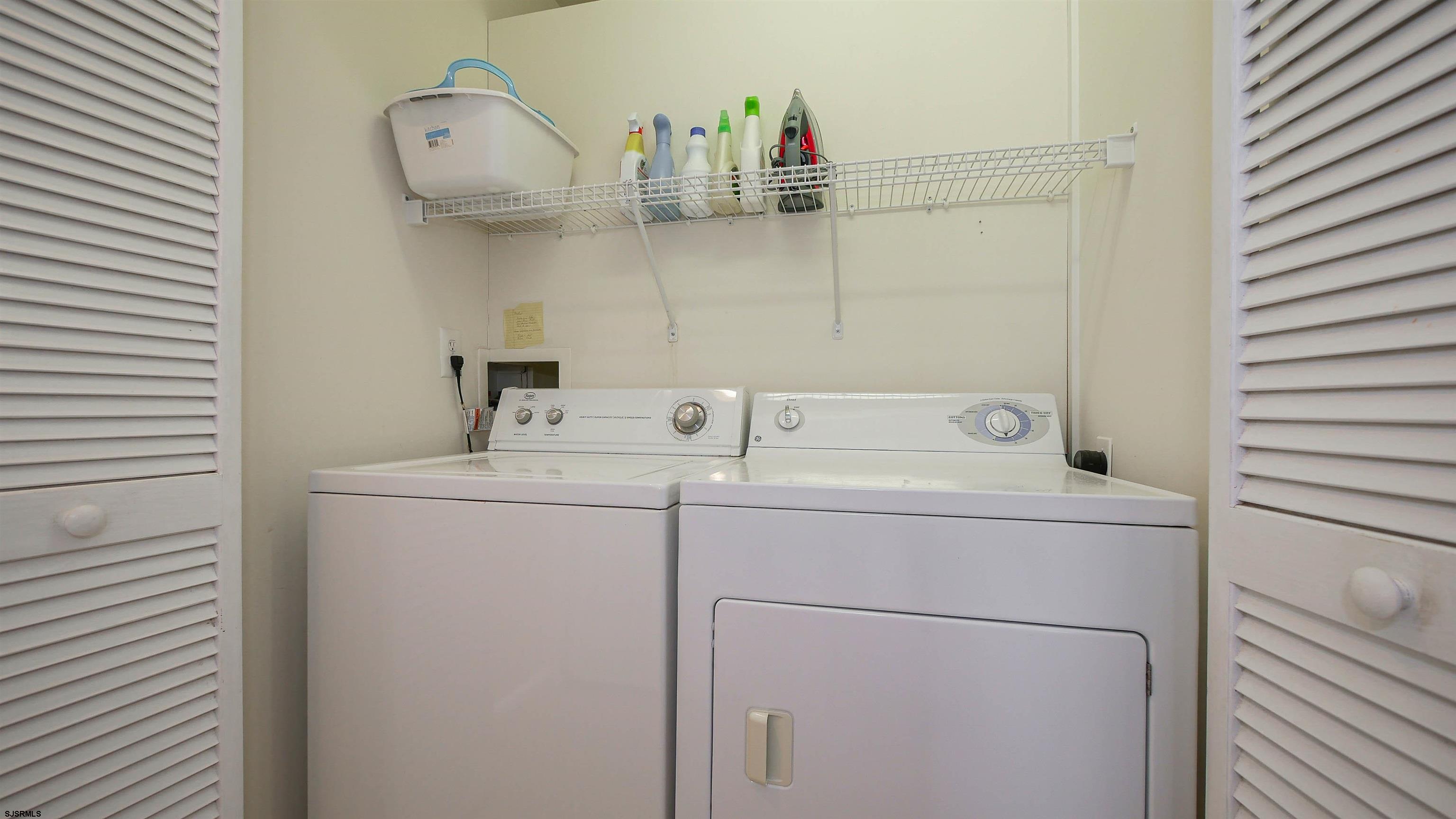 1910 Central Avenue, Unit B Ocean City, NJ 08226 - Photo 36 of 45 a utility room with dryer and washer