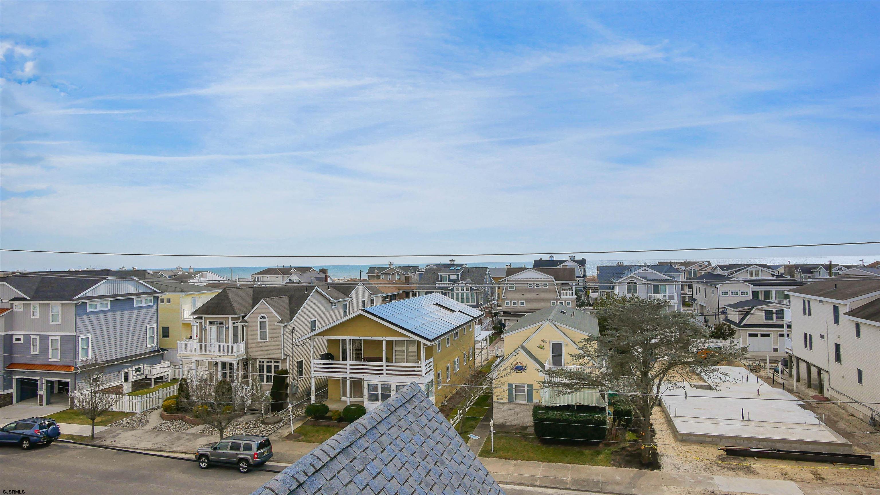 1910 Central Avenue, Unit B Ocean City, NJ 08226 - Photo 39 of 45 an aerial view of a residential apartment building with parking space