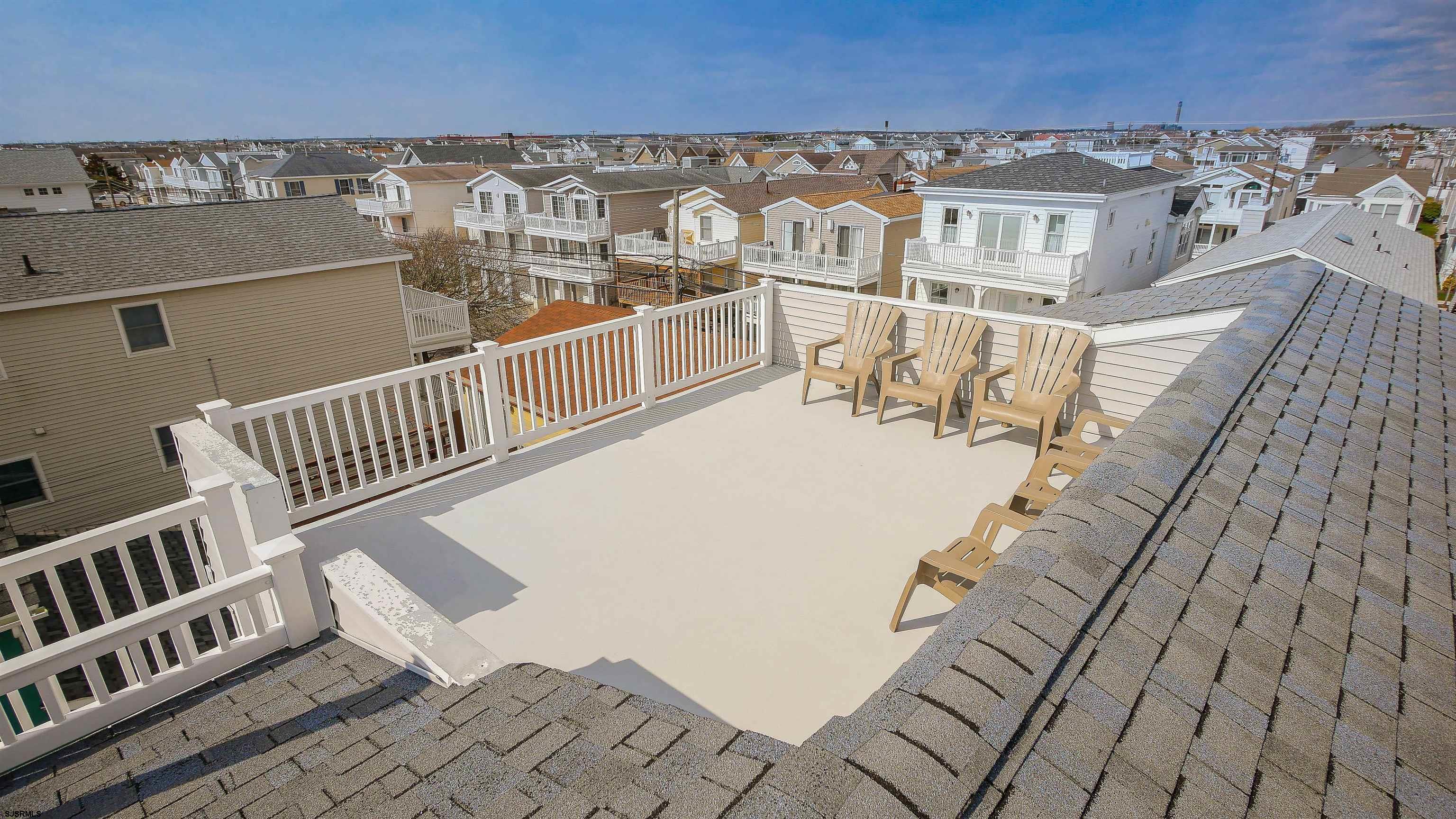 1910 Central Avenue, Unit B Ocean City, NJ 08226 - Photo 42 of 45 a view of a balcony with wooden floor