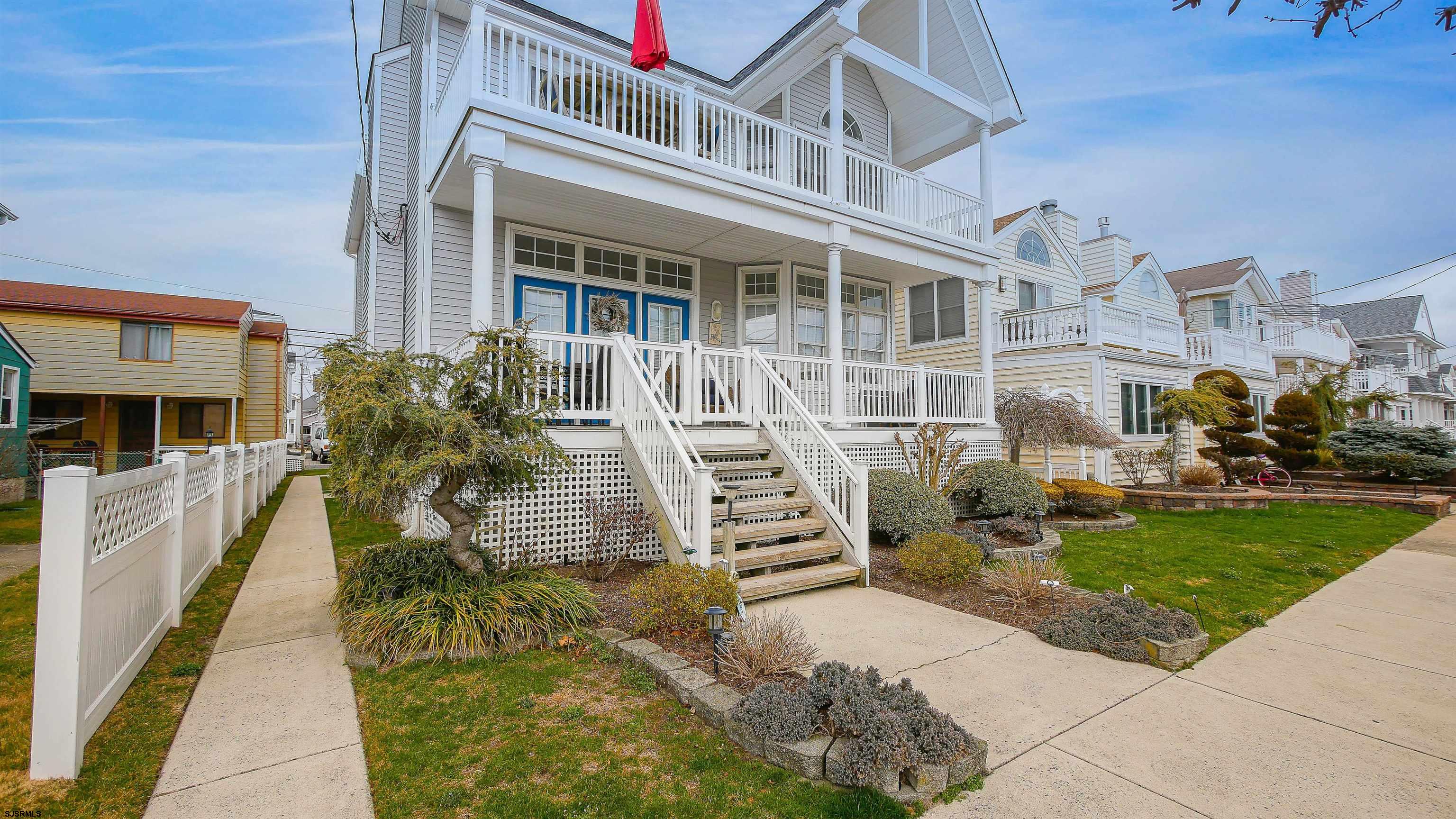 1910 Central Avenue, Unit B Ocean City, NJ 08226 - Photo 44 of 45 a front view of a building with a garden