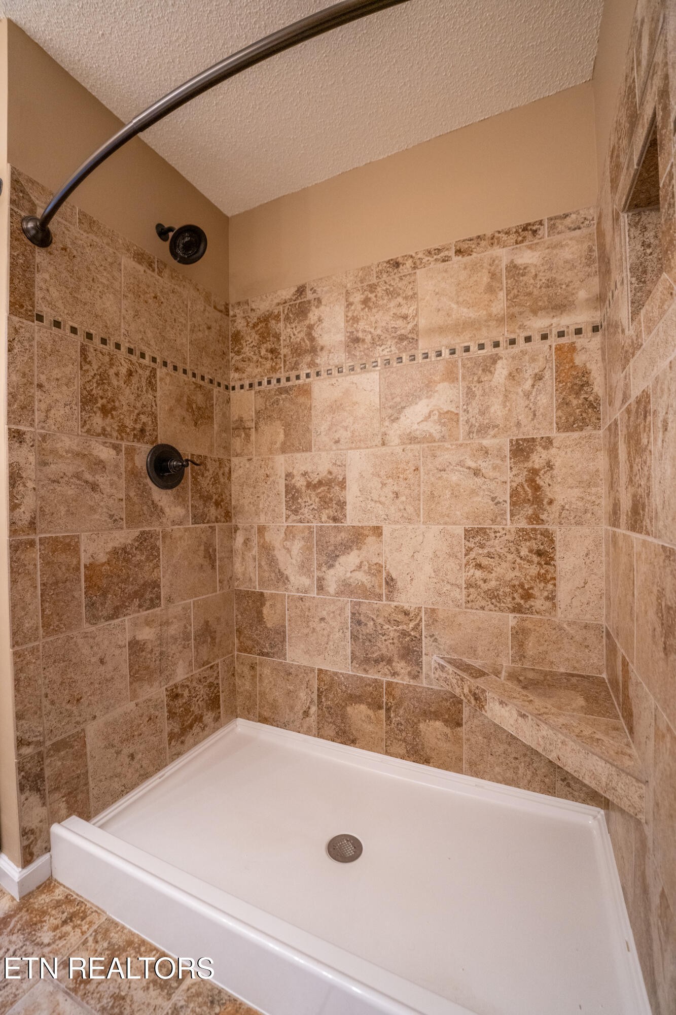 8024 Stablegate Way Powell, TN 37849 - Photo 15 of 35 a bathroom with a bathtub and shower