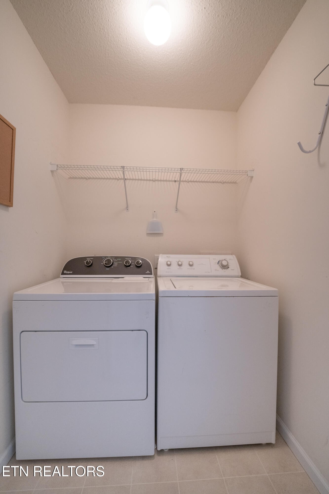 8024 Stablegate Way Powell, TN 37849 - Photo 18 of 35 a utility room with dryer and washer