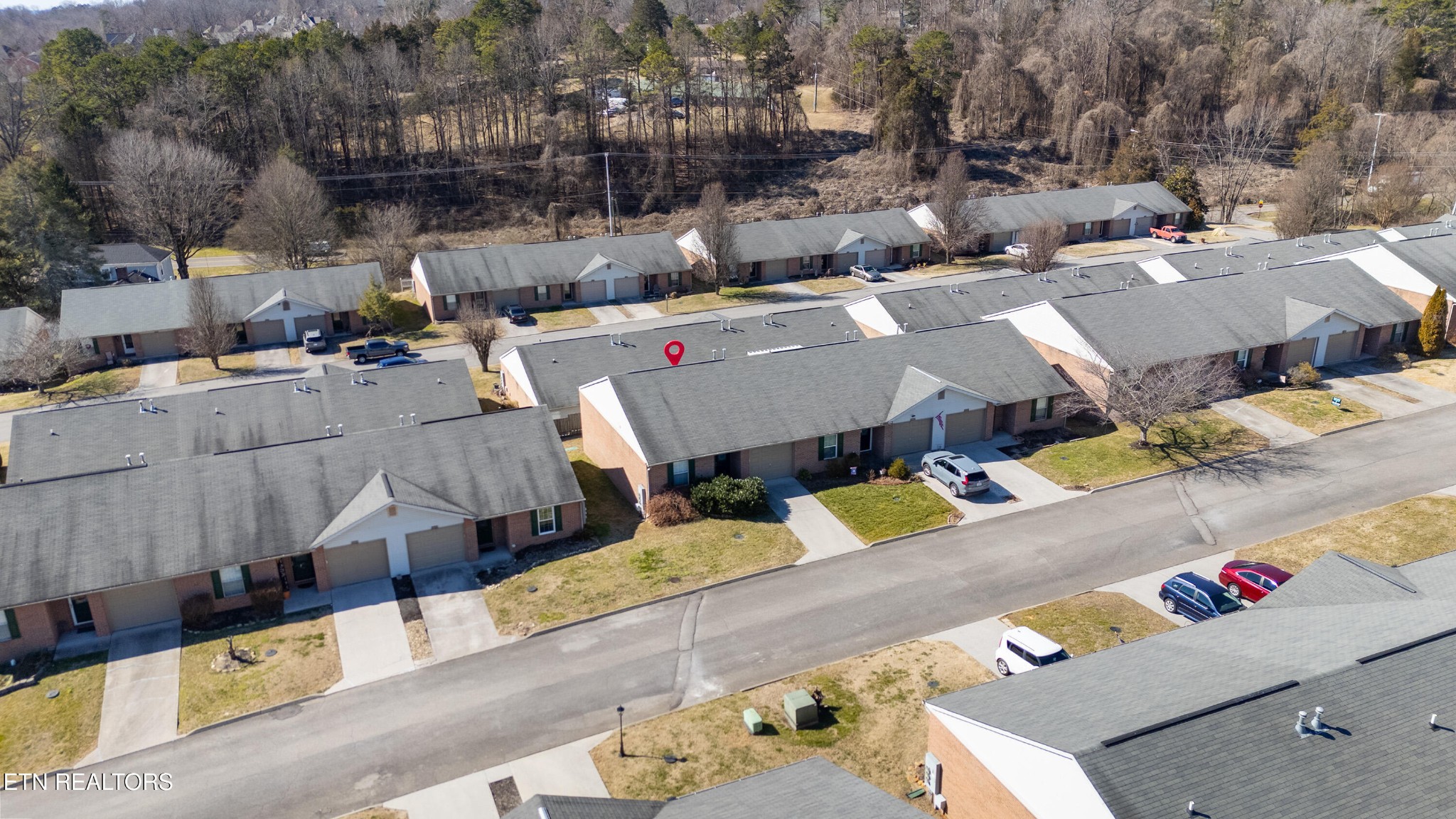 8024 Stablegate Way Powell, TN 37849 - Photo 25 of 35 an aerial view of a house with a swimming pool