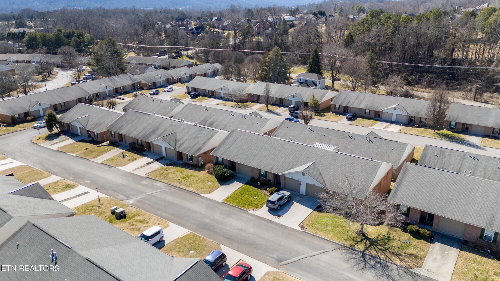 8024 Stablegate Way Powell, TN 37849 - Photo 27 of 35 an aerial view of a house with a swimming pool