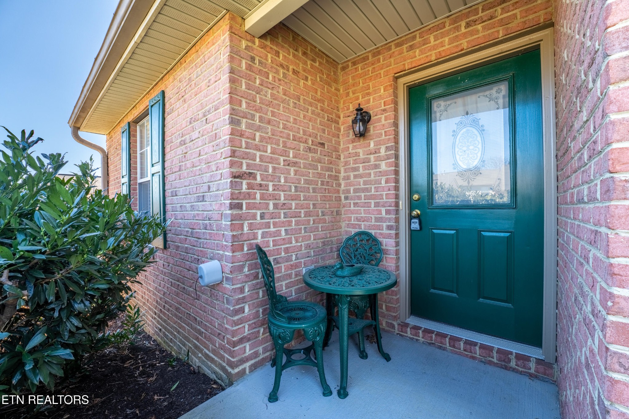 8024 Stablegate Way Powell, TN 37849 - Photo 4 of 35 a view of a chair and table in the balcony