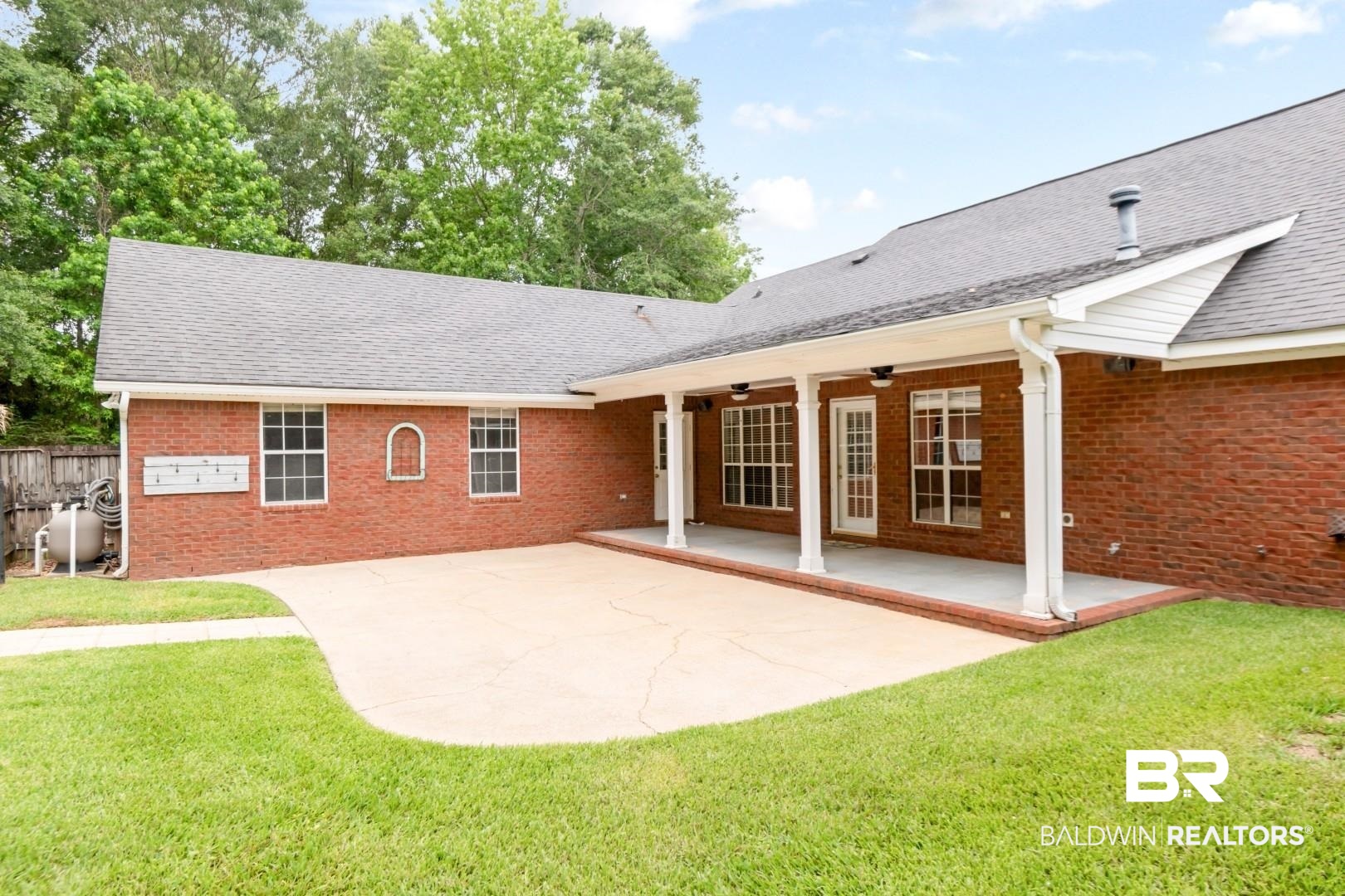 10691 Hunters Ridge Drive Mobile, AL 36695 - Photo 32 of 37 Expansive brick exterior with a large concrete patio