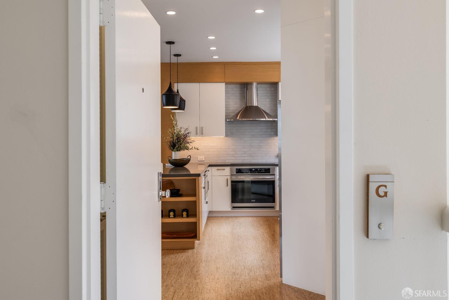 370 Church Street, Unit G San Francisco, CA 94114 - Photo 2 of 65 a kitchen with stainless steel appliances granite countertop a refrigerator and a stove top oven