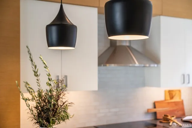 a view of a livingroom with furniture and staircase