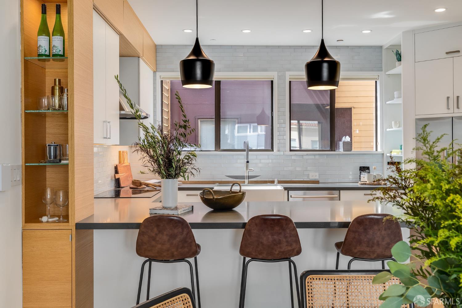 370 Church Street, Unit G San Francisco, CA 94114 - Photo 23 of 65 a kitchen with stainless steel appliances granite countertop a sink a microwave a refrigerator and white cabinets