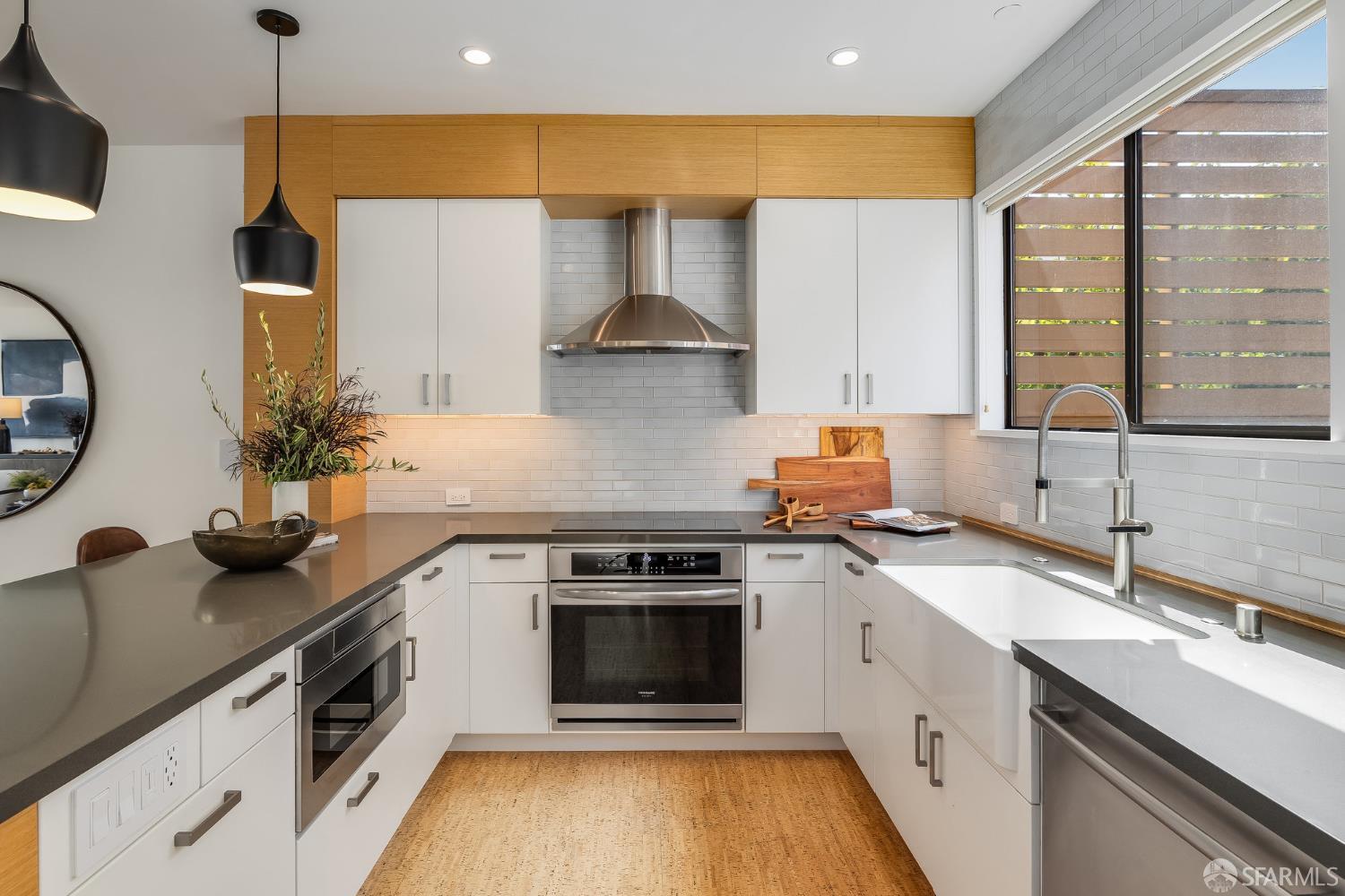 370 Church Street, Unit G San Francisco, CA 94114 - Photo 24 of 65 a kitchen with a sink stove and cabinets