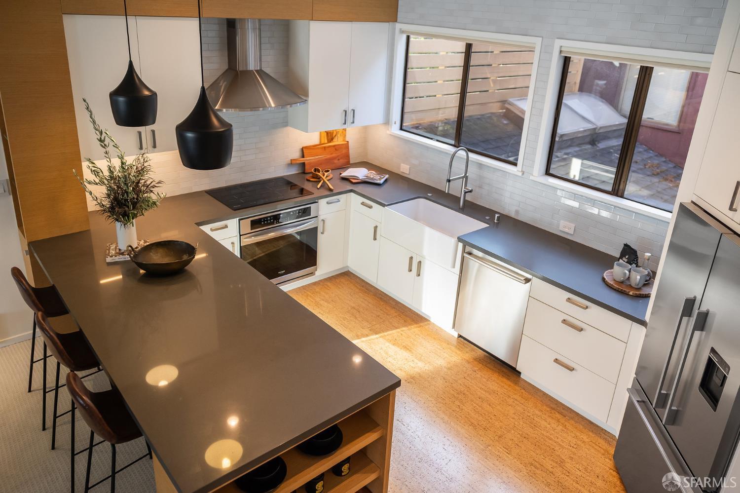 370 Church Street, Unit G San Francisco, CA 94114 - Photo 25 of 65 a kitchen with a sink a stove and white cabinets