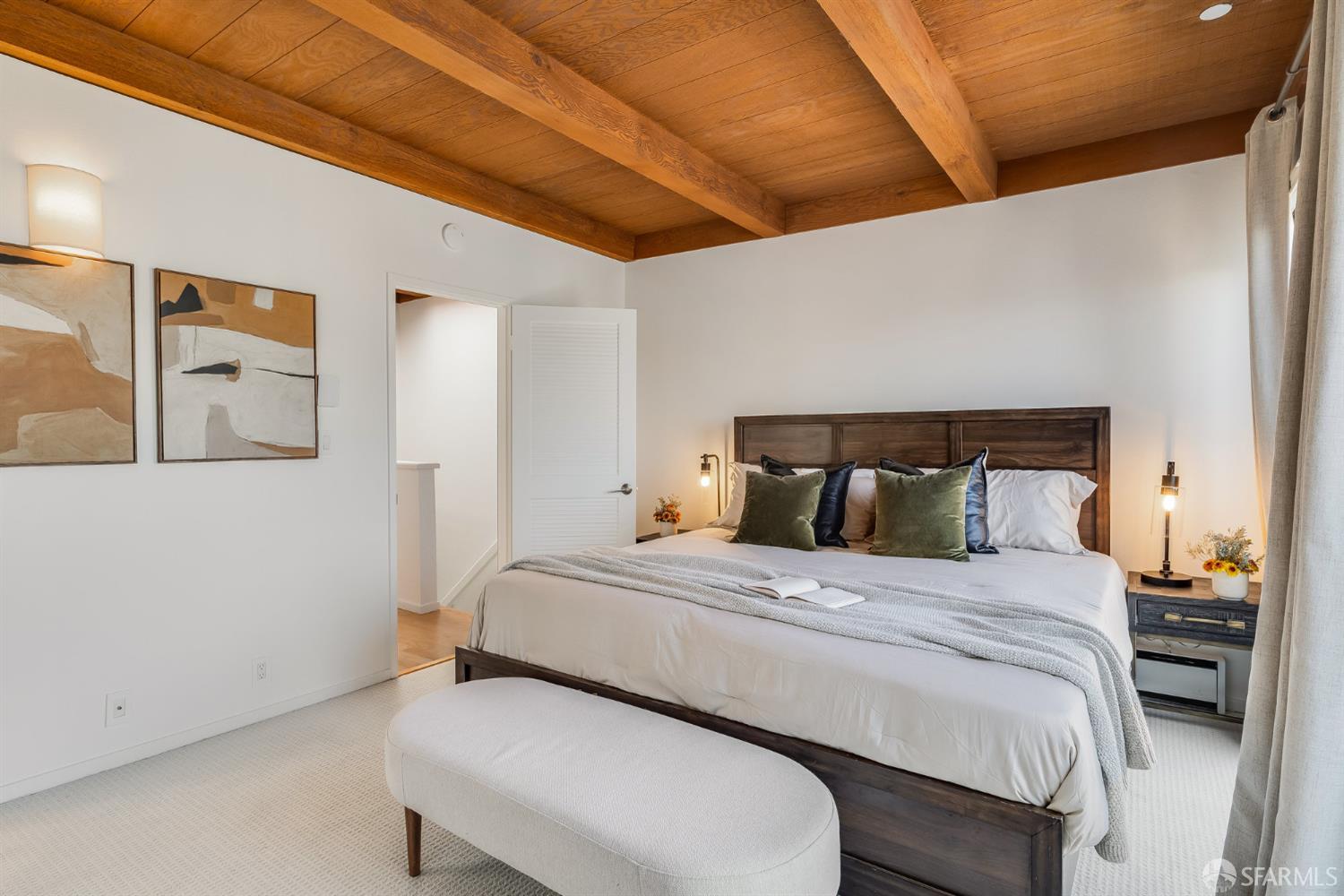 370 Church Street, Unit G San Francisco, CA 94114 - Photo 30 of 65 a bedroom with a bed and a lamp