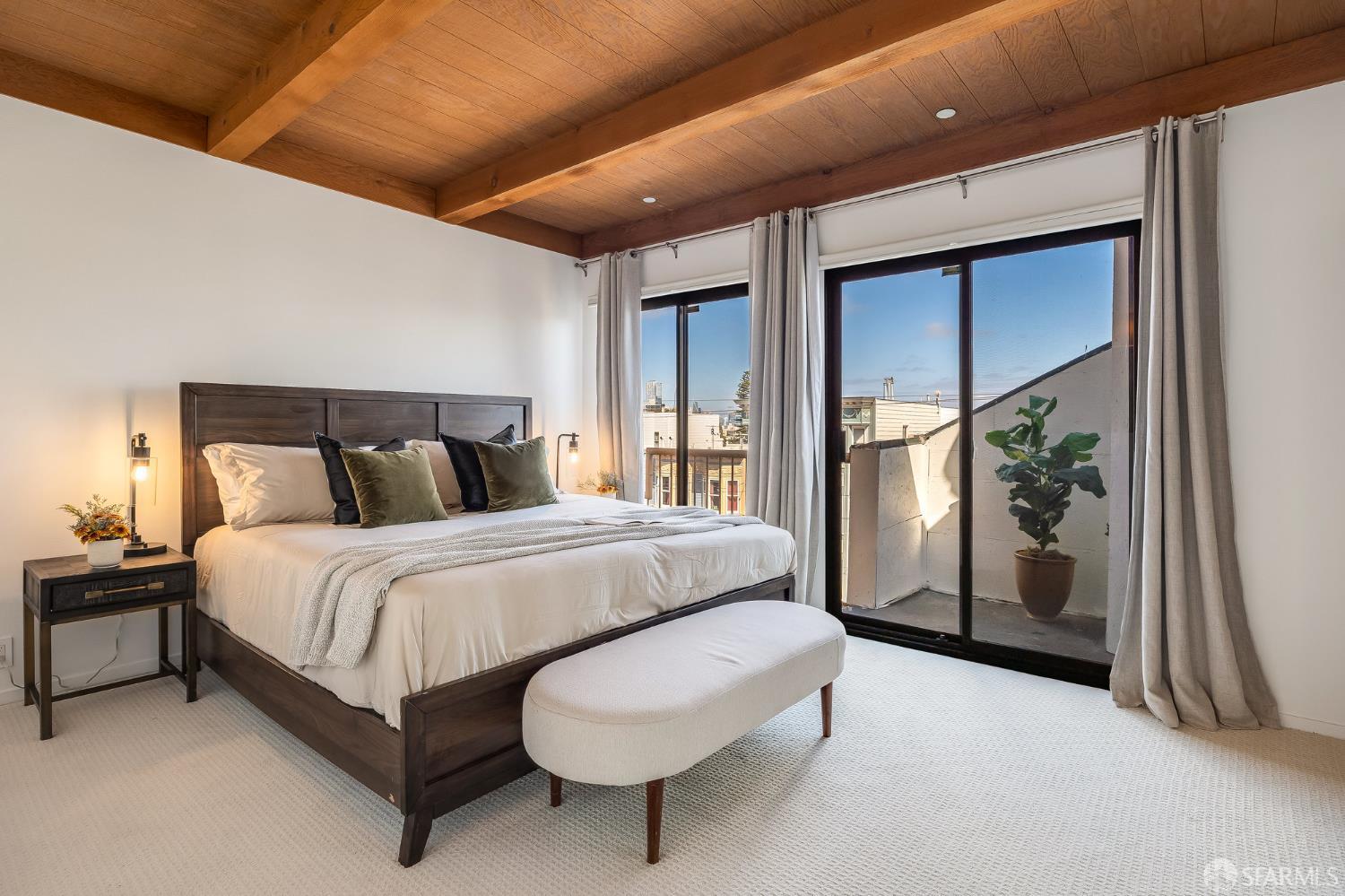 370 Church Street, Unit G San Francisco, CA 94114 - Photo 31 of 65 a bedroom with a bed and a large window