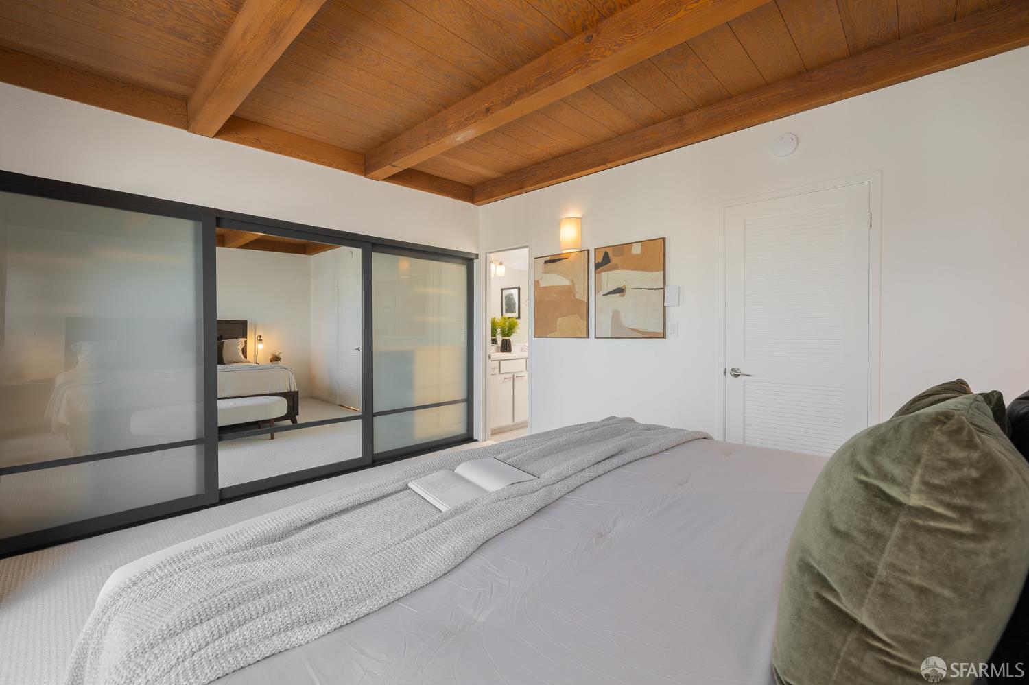 370 Church Street, Unit G San Francisco, CA 94114 - Photo 36 of 65 a bedroom with a large bed and a window