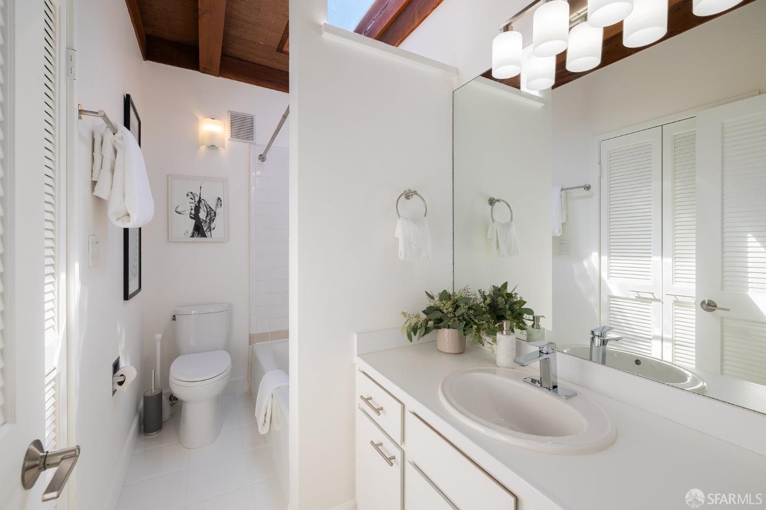 370 Church Street, Unit G San Francisco, CA 94114 - Photo 41 of 65 a bathroom with a sink toilet and shower