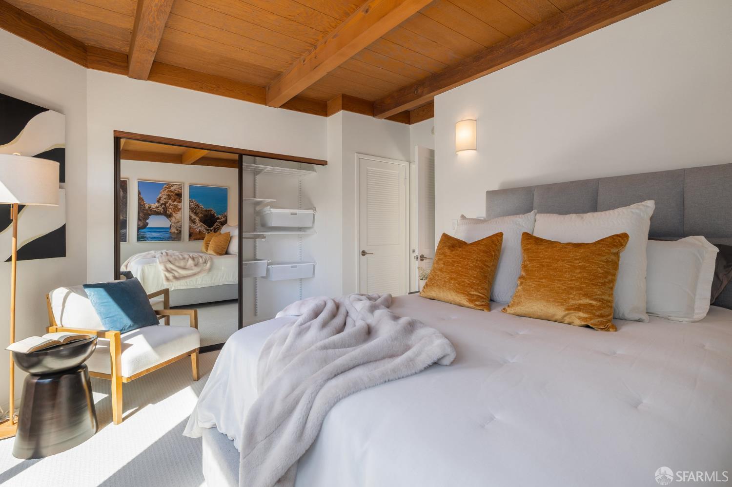 370 Church Street, Unit G San Francisco, CA 94114 - Photo 47 of 65 a bedroom with a bed and wooden floor