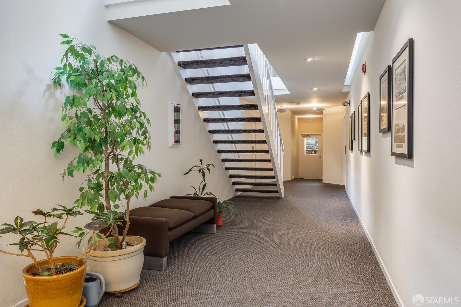 370 Church Street, Unit G San Francisco, CA 94114 - Photo 52 of 65 a living room with furniture and a potted plant