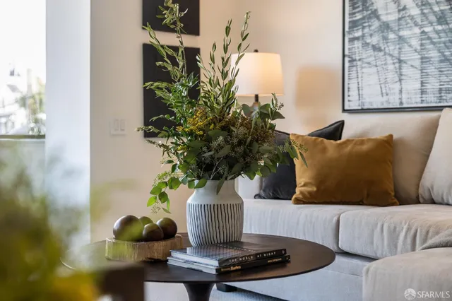 a vase of flowers sitting on a table