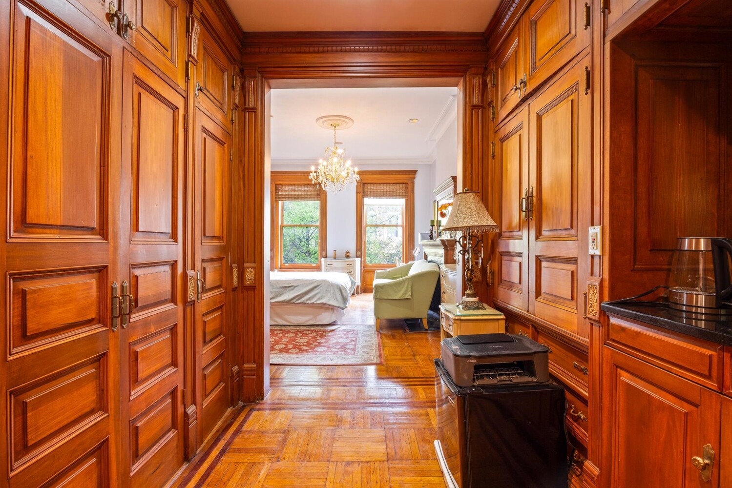 329 Convent Avenue Manhattan, NY 10031 - Photo 17 of 28 a view of living room with furniture and floor to ceiling windows