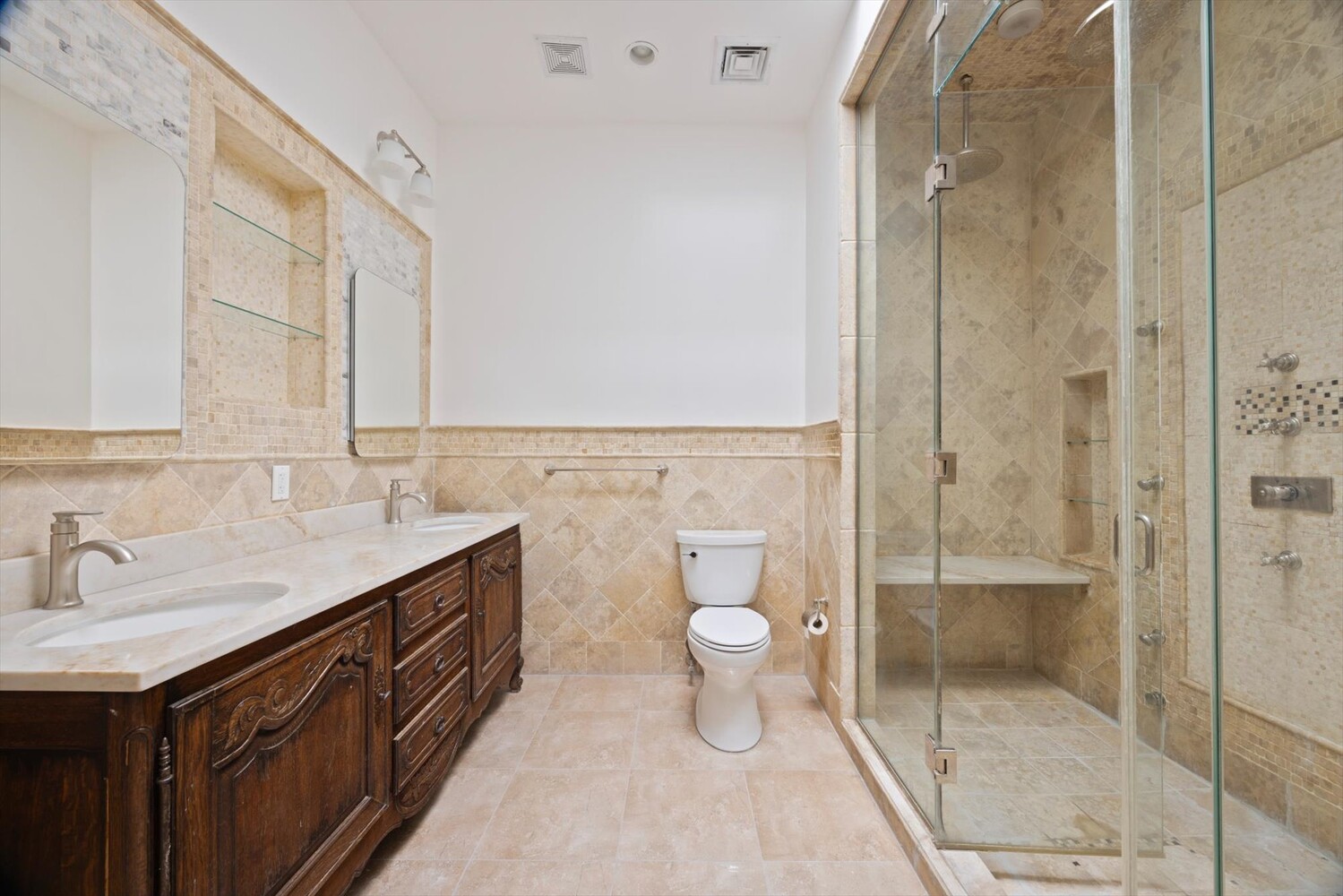329 Convent Avenue Manhattan, NY 10031 - Photo 20 of 28 a bathroom with a sink a toilet and shower