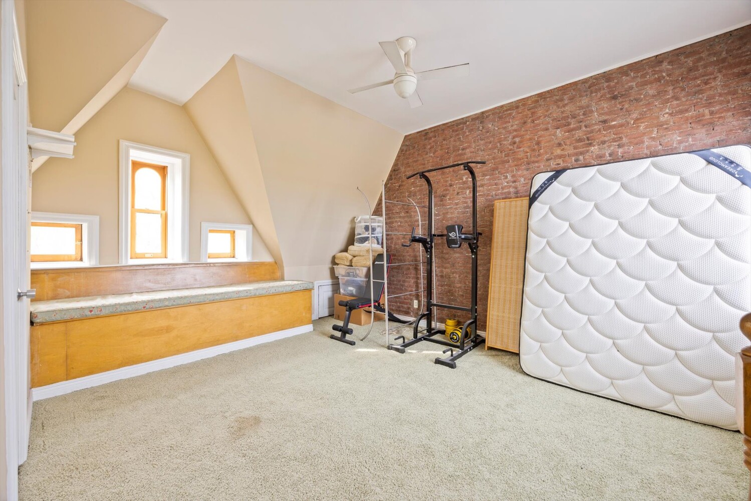 329 Convent Avenue Manhattan, NY 10031 - Photo 21 of 28 a view of a room with gym equipment