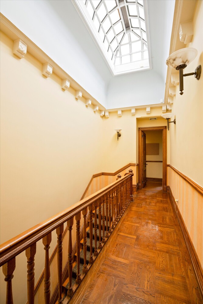 329 Convent Avenue Manhattan, NY 10031 - Photo 25 of 28 a view of hallway with stairs