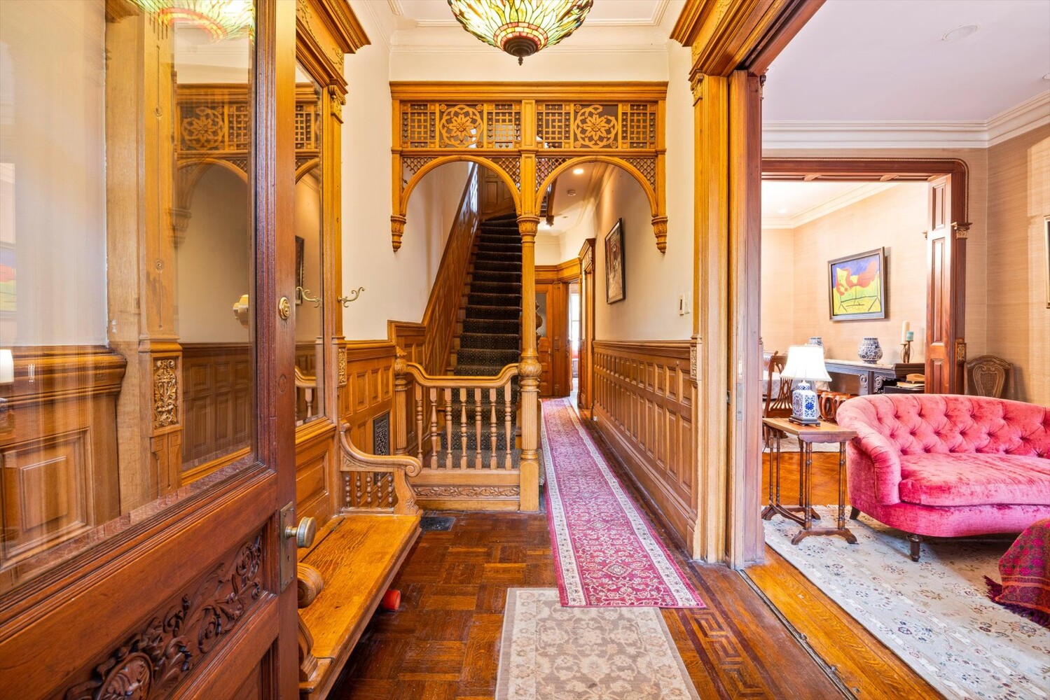 329 Convent Avenue Manhattan, NY 10031 - Photo 2 of 28 a view of a balcony with wooden floor