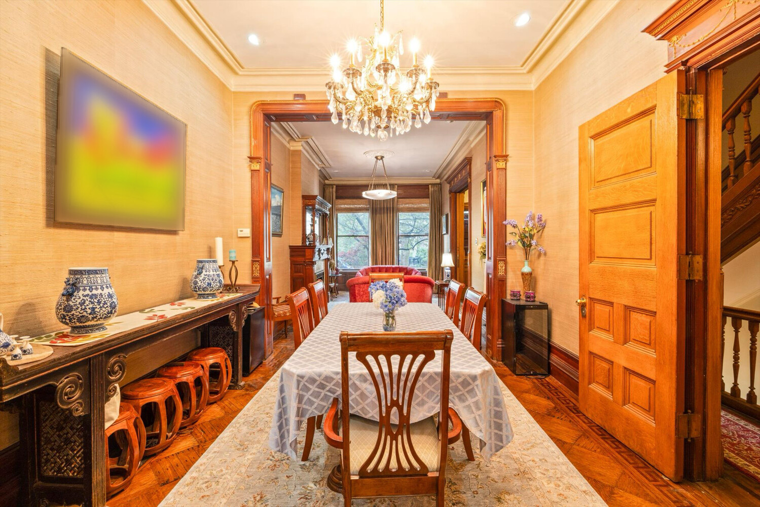 329 Convent Avenue Manhattan, NY 10031 - Photo 4 of 28 a view of a chandelier and dining room