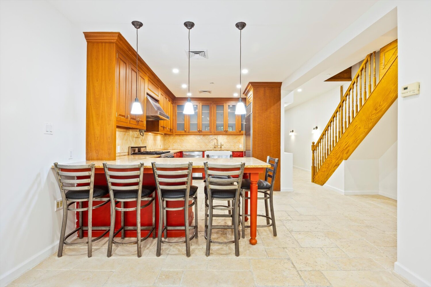 329 Convent Avenue Manhattan, NY 10031 - Photo 8 of 28 a dining table chairs and a chandelier