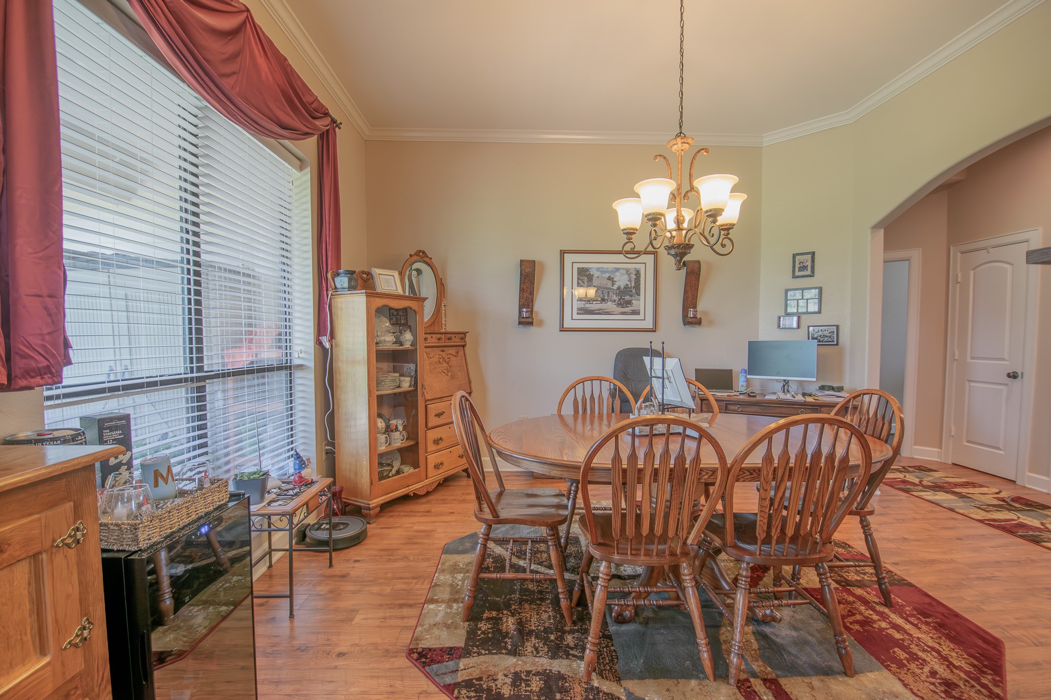 302 Mayad Boulevard Rosharon, TX 77583 - Photo 14 of 42 a view of a dining room with furniture and chandelier