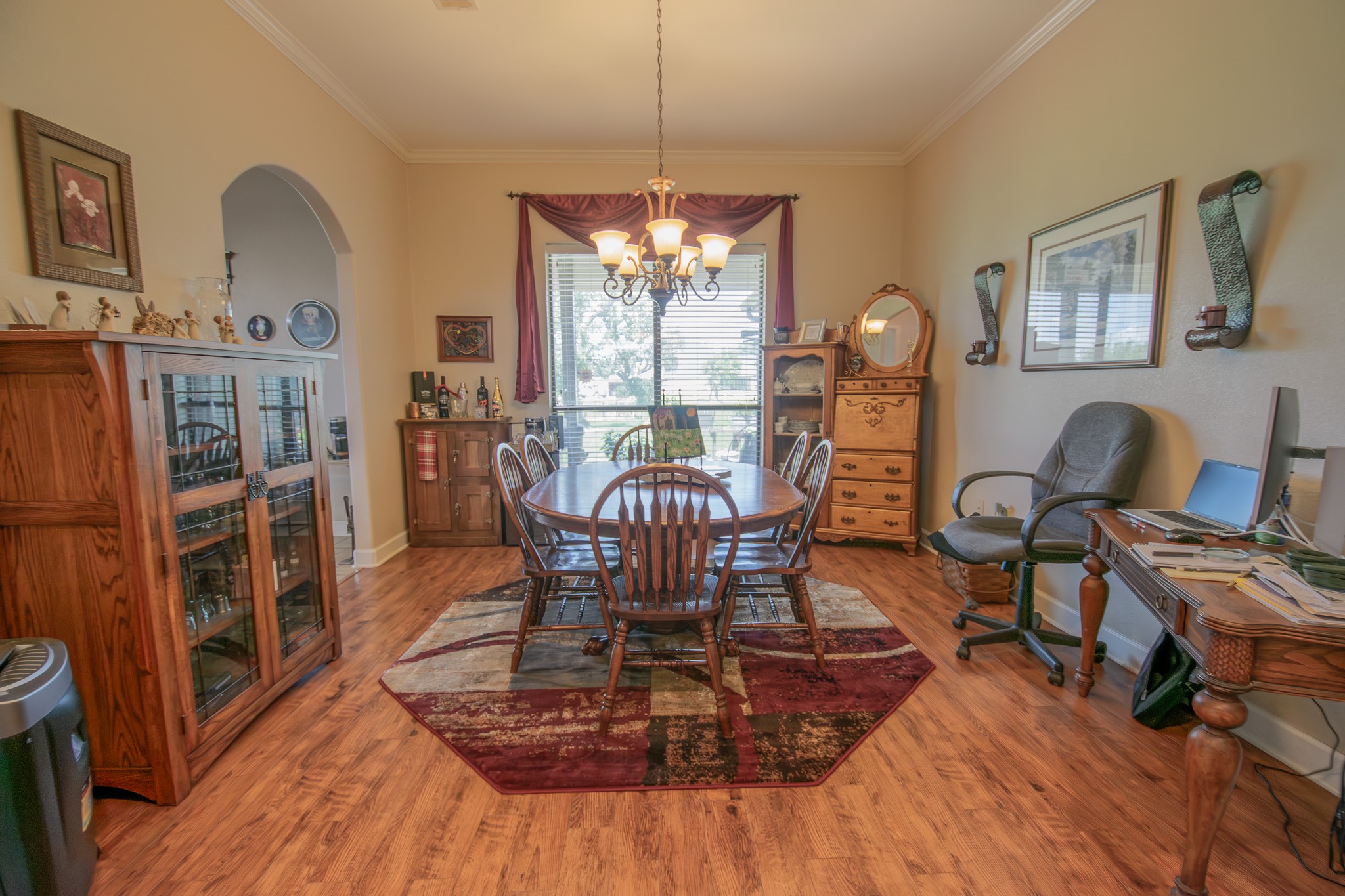 302 Mayad Boulevard Rosharon, TX 77583 - Photo 15 of 42 a view of a dining room with furniture window and wooden floor