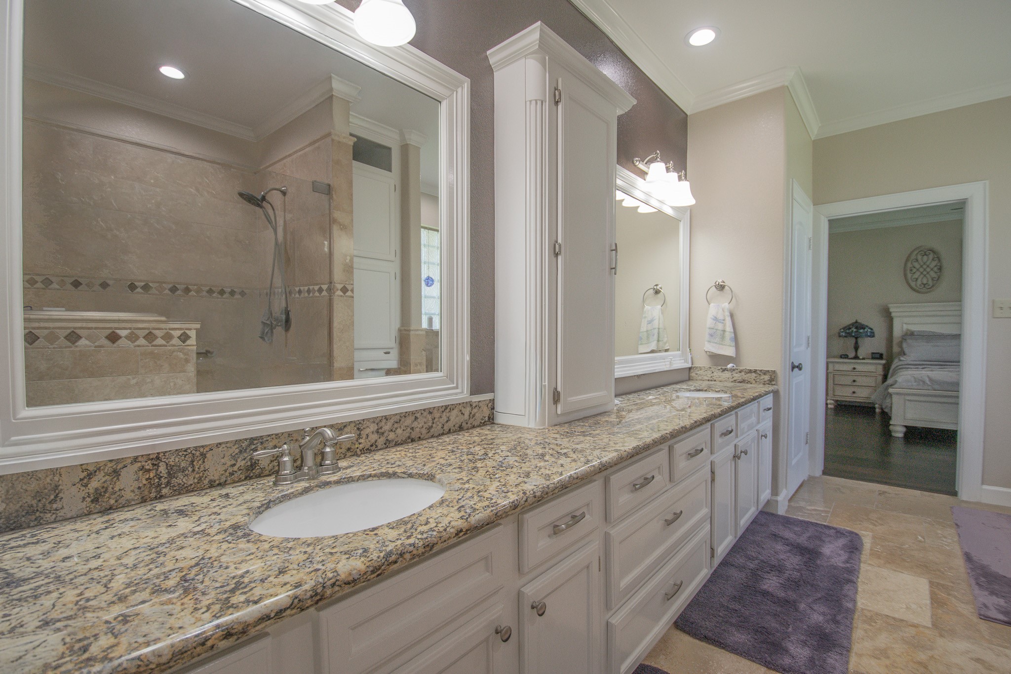 302 Mayad Boulevard Rosharon, TX 77583 - Photo 22 of 42 a bathroom with a granite countertop double vanity sink and a mirror