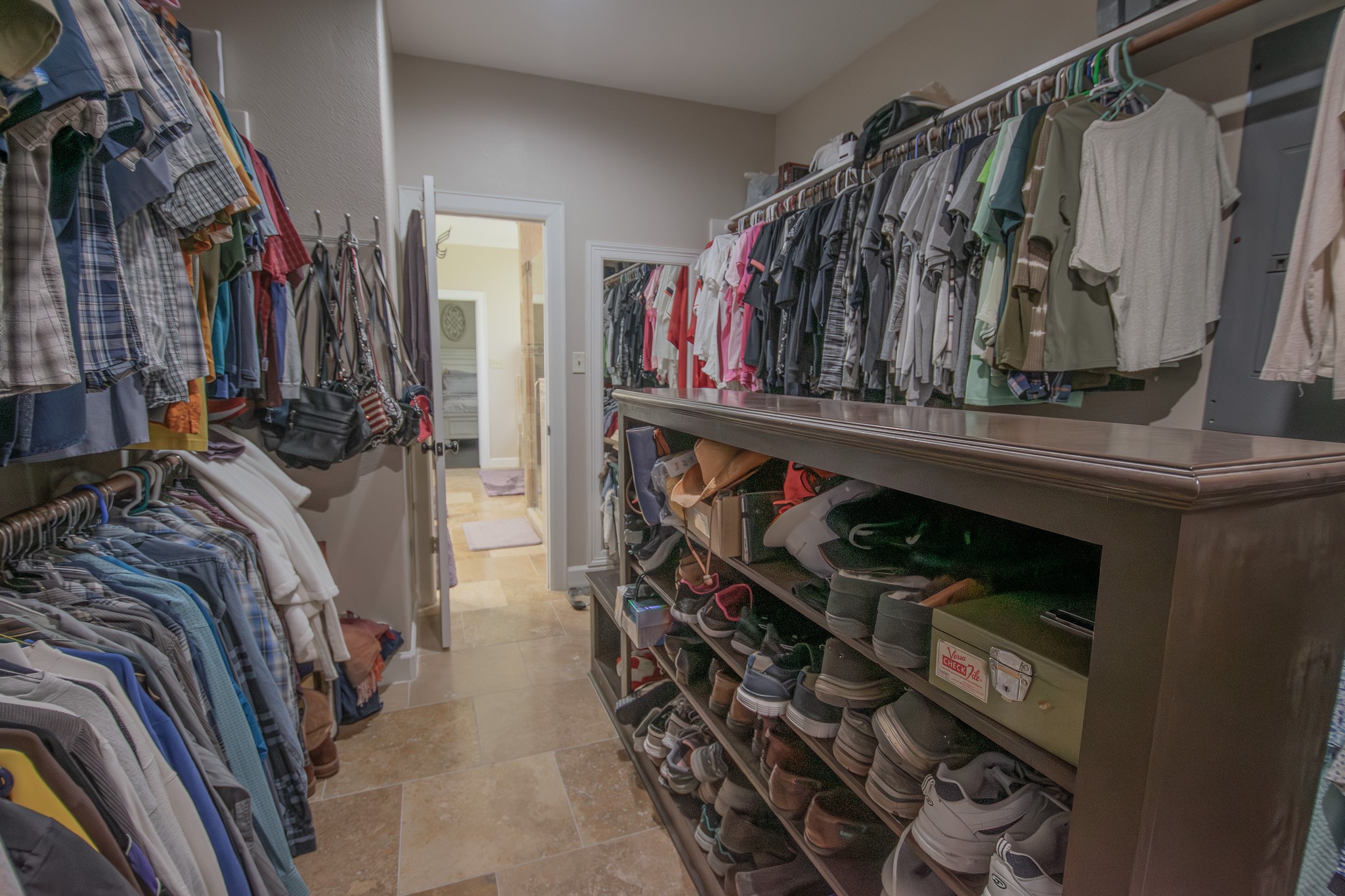 302 Mayad Boulevard Rosharon, TX 77583 - Photo 26 of 42 a view of walk in closet with clothes and shoes