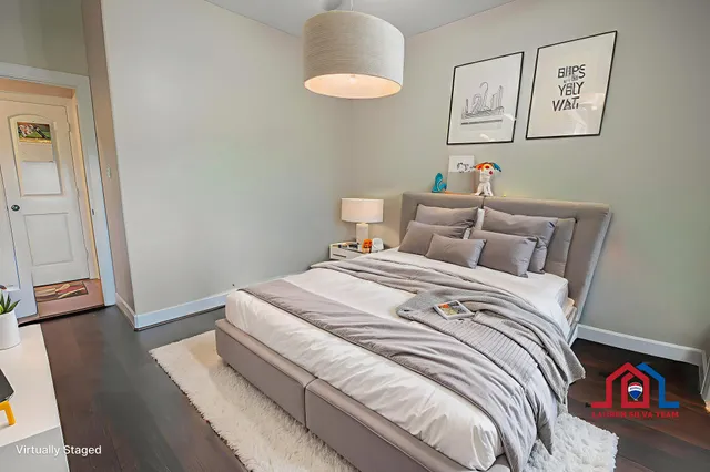 a front view of a house with a yard table and chairs