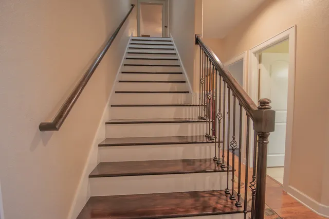 a view of house with garden and backyard