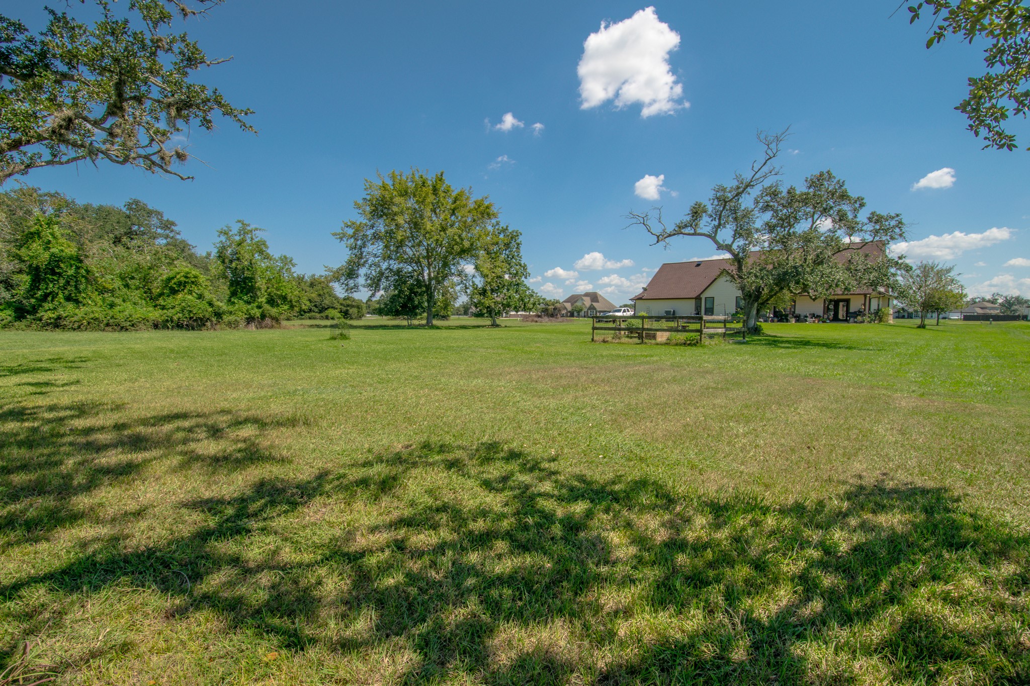 302 Mayad Boulevard Rosharon, TX 77583 - Photo 38 of 42 a view of a big yard with a house in the background