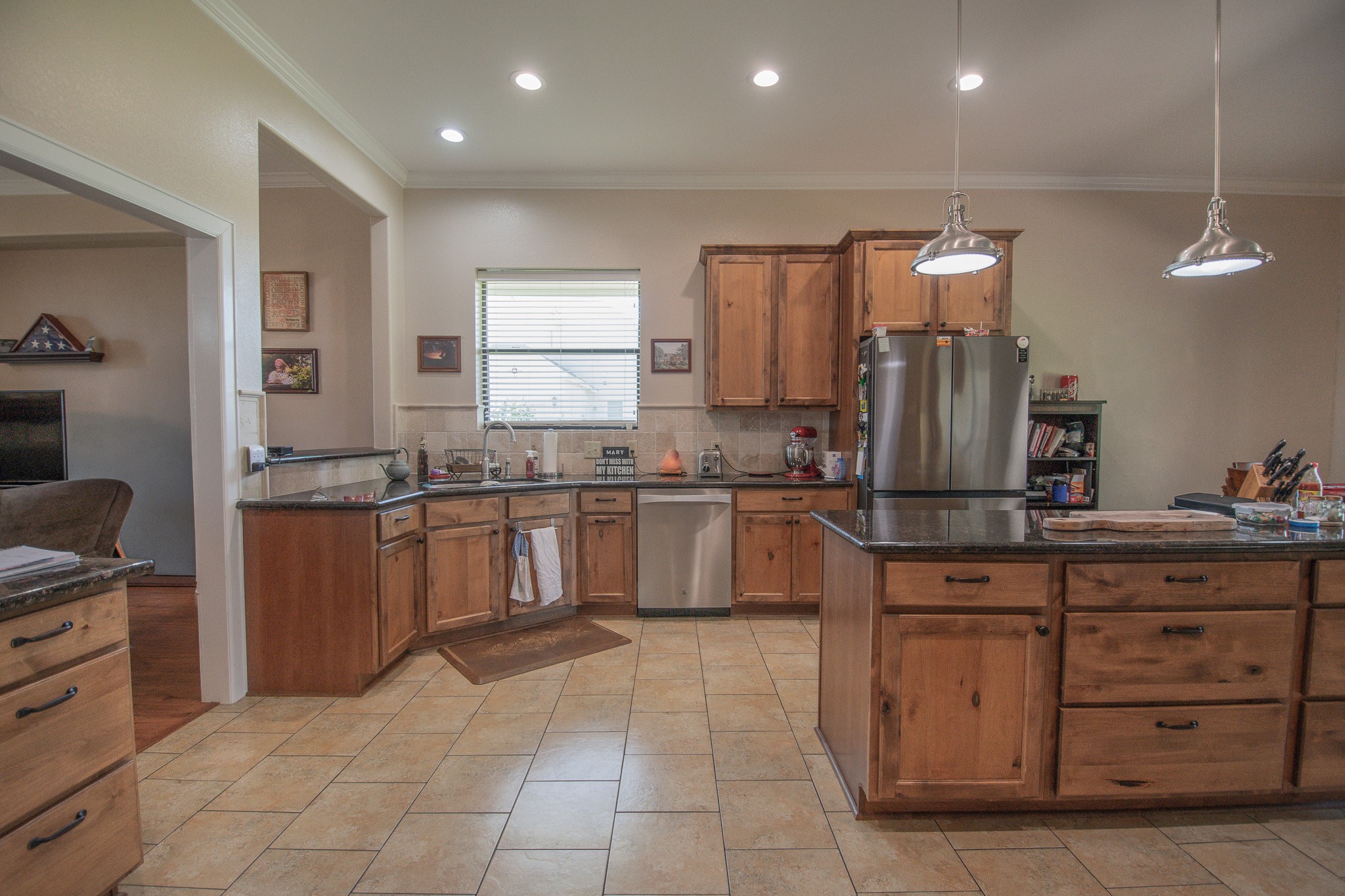 302 Mayad Boulevard Rosharon, TX 77583 - Photo 8 of 42 a kitchen with a sink counter top space appliances and cabinets