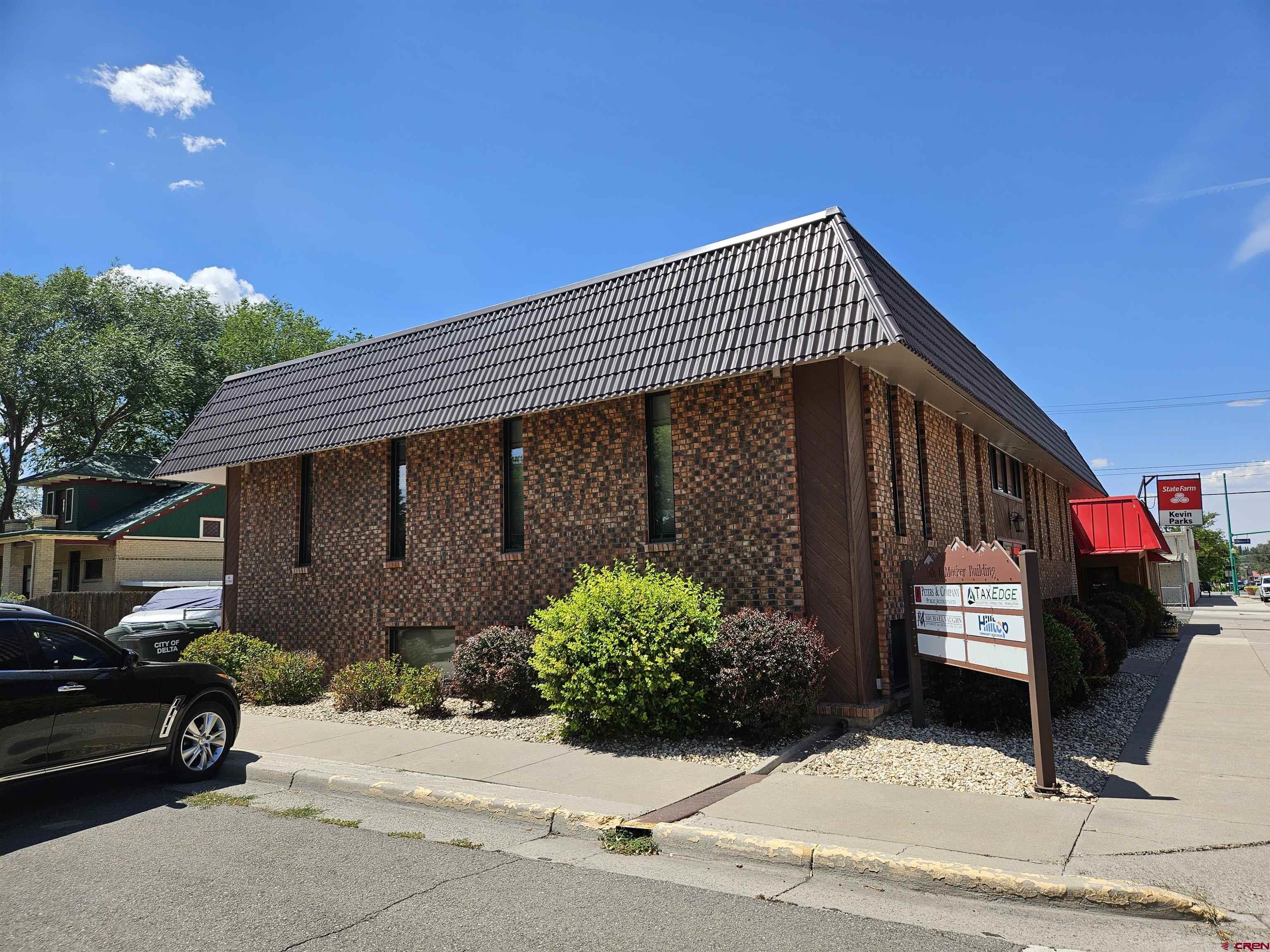 132 East 5th Street, Unit 201 Delta, CO 81416 - Photo 1 of 8 a front view of a house
