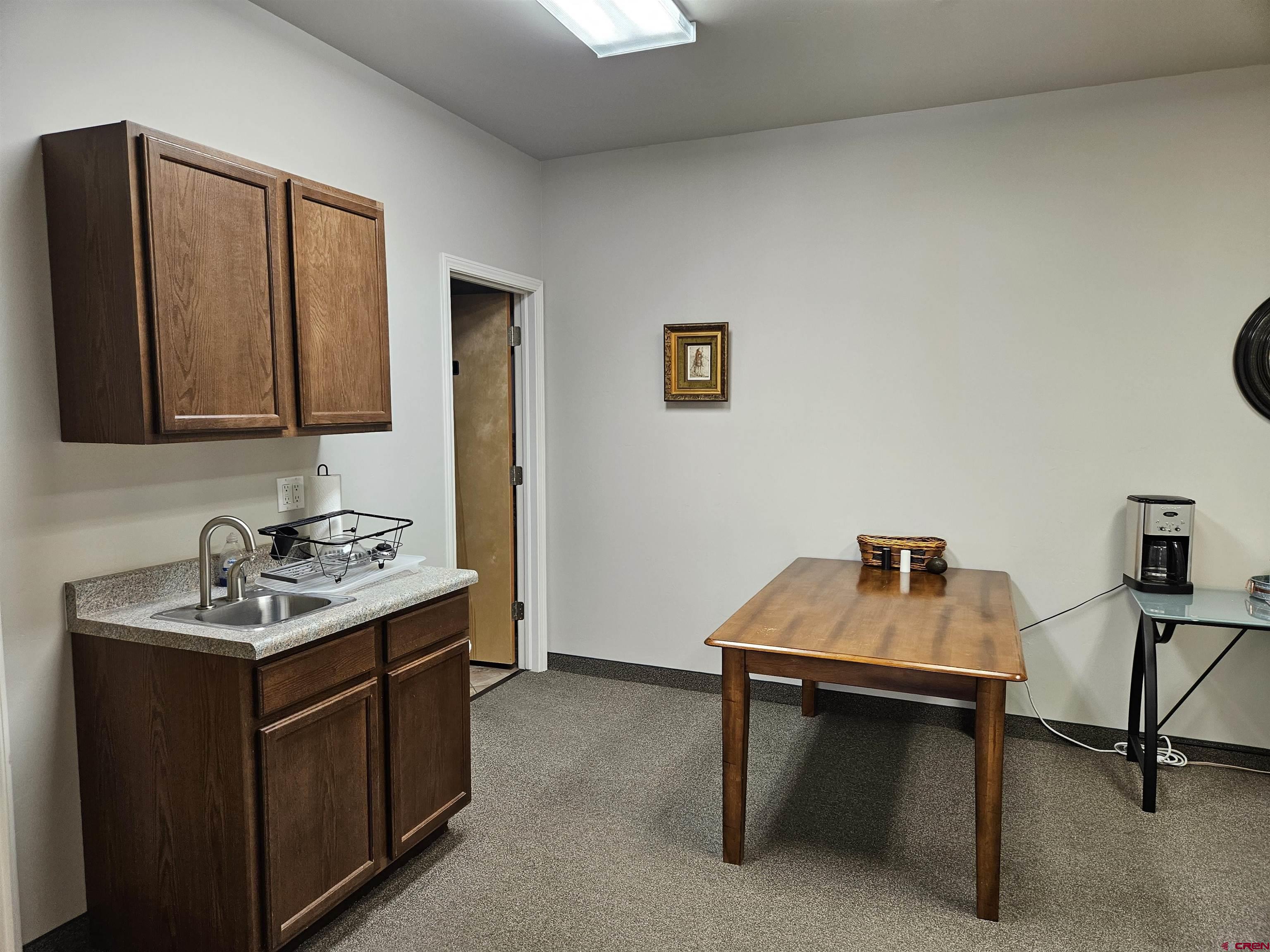 132 East 5th Street, Unit 201 Delta, CO 81416 - Photo 7 of 8 a room with furniture and window