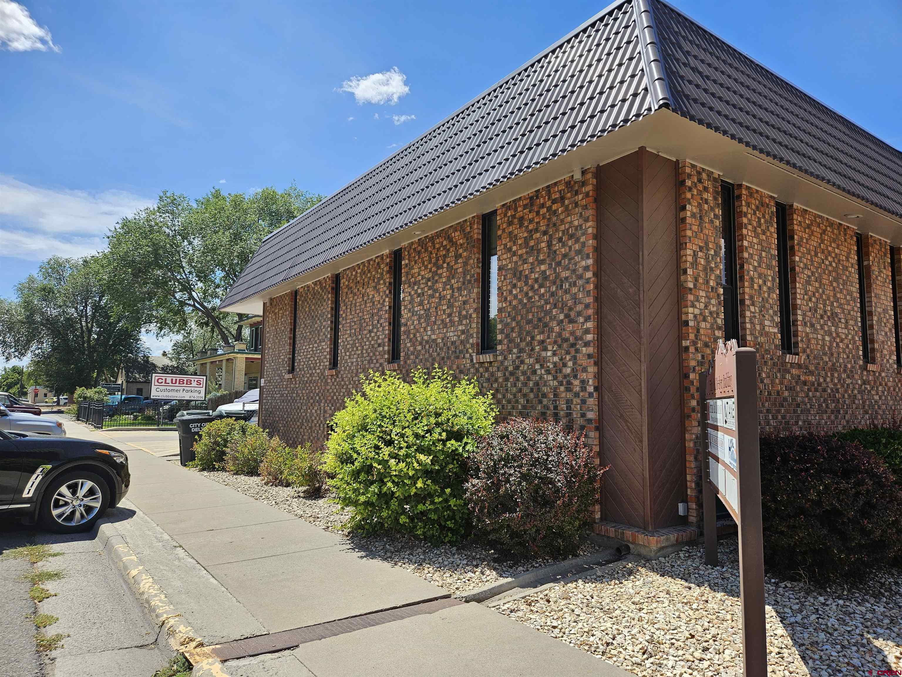 132 East 5th Street, Unit 201 Delta, CO 81416 - Photo 8 of 8 a front view of a house with garden