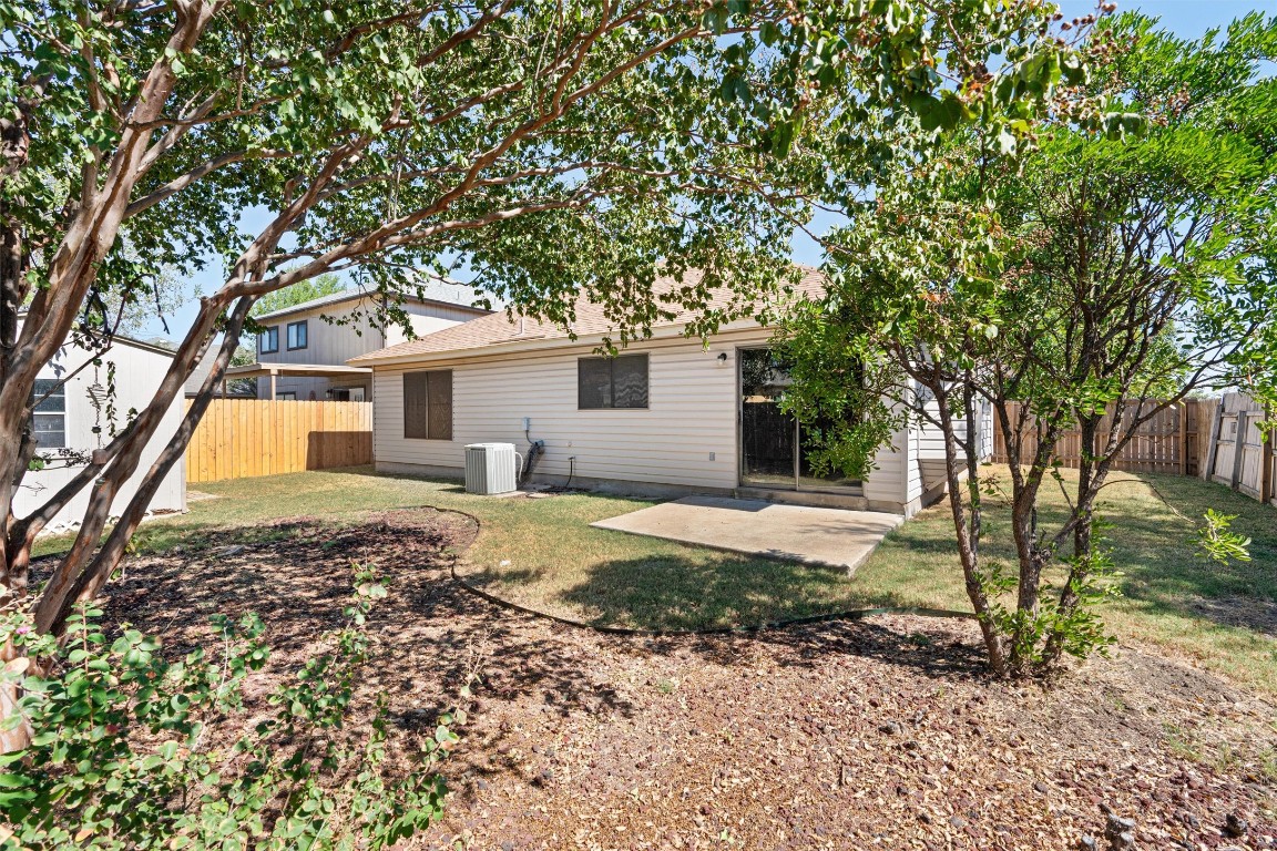 1353 Lakeside Loop Round Rock, TX 78665 - Photo 24 of 29 a house with a tree in front of it