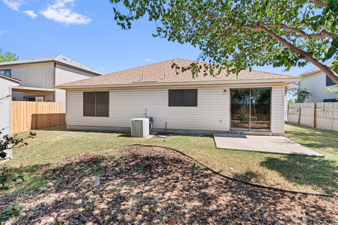 1353 Lakeside Loop Round Rock, TX 78665 - Photo 25 of 29 a front view of a house with garden