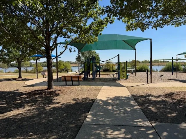 a view of street with palm trees