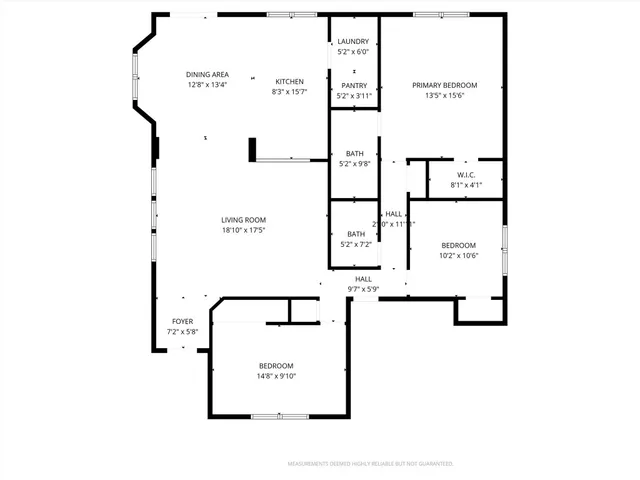 a picture of a bench in front of a wall