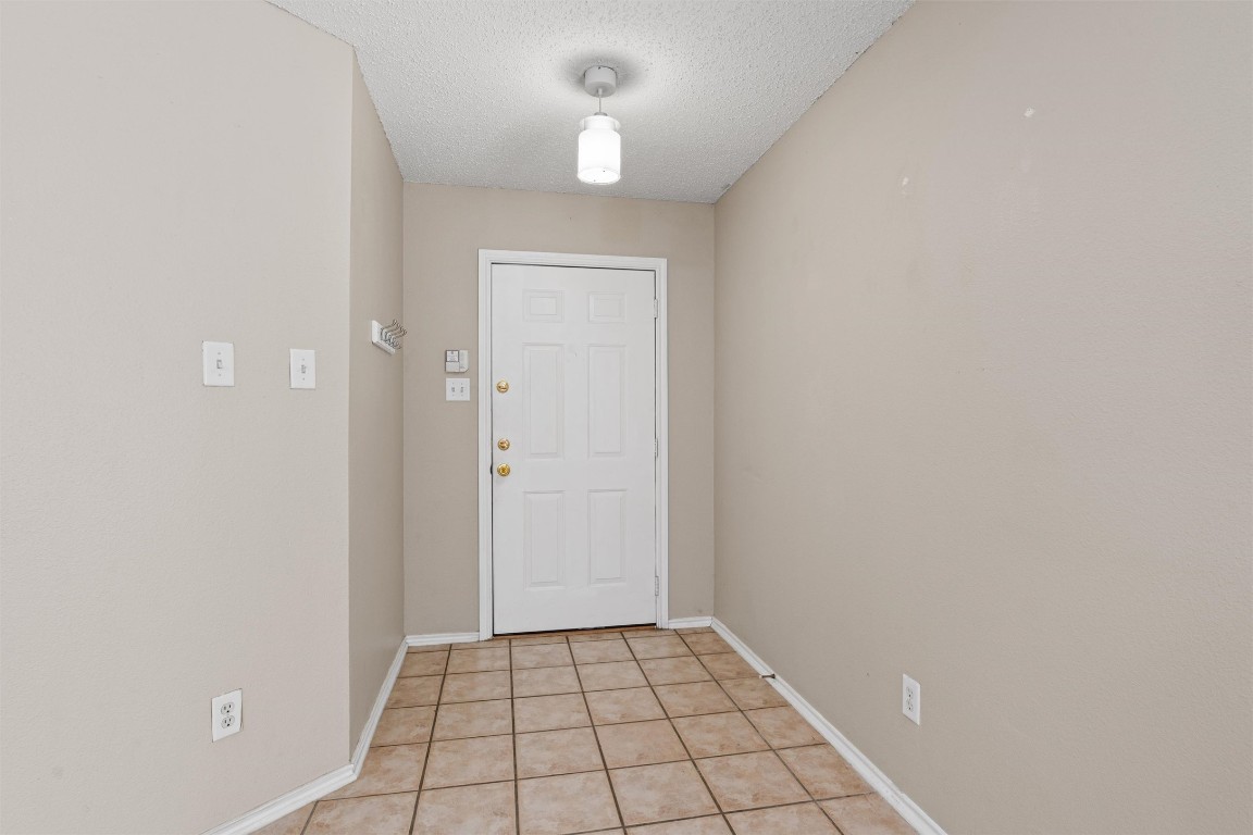 1353 Lakeside Loop Round Rock, TX 78665 - Photo 4 of 29 a view of an empty room and chandelier fan