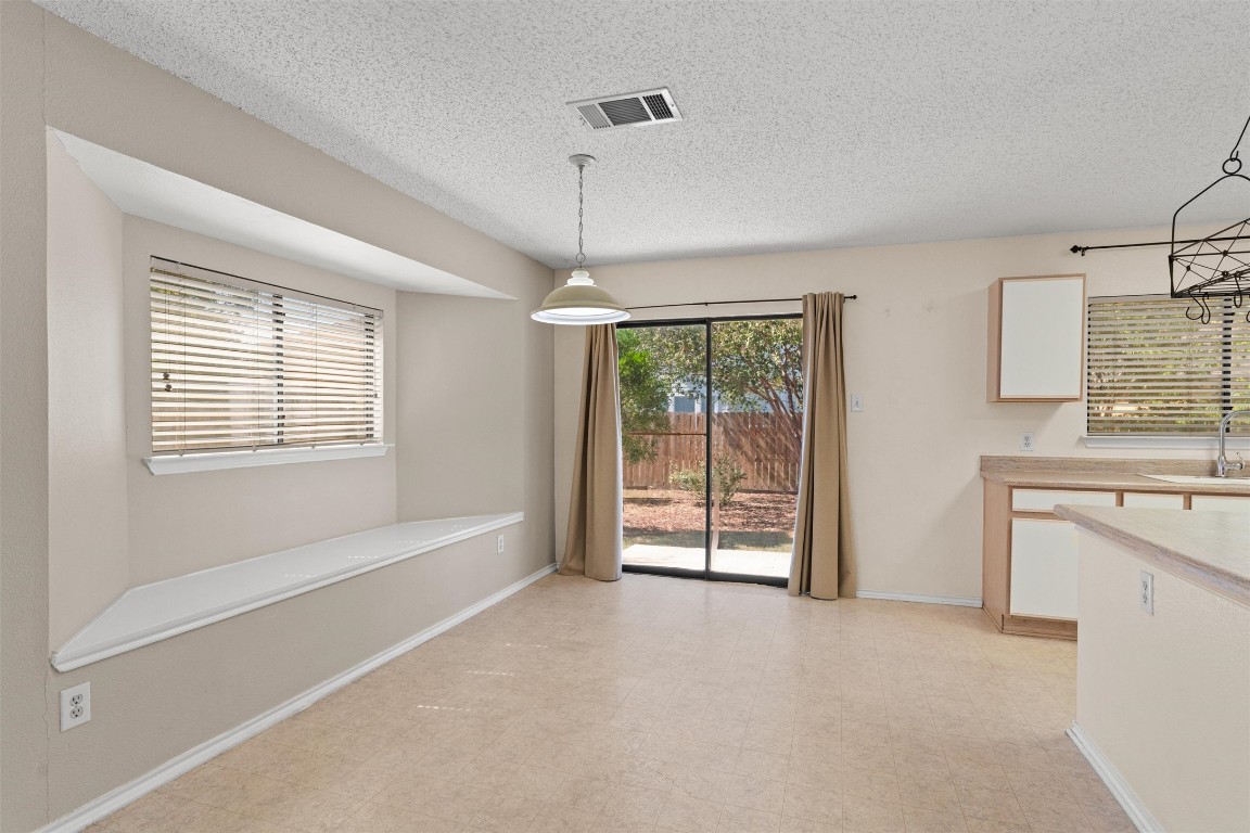 1353 Lakeside Loop Round Rock, TX 78665 - Photo 8 of 29 a view of an empty room with a window
