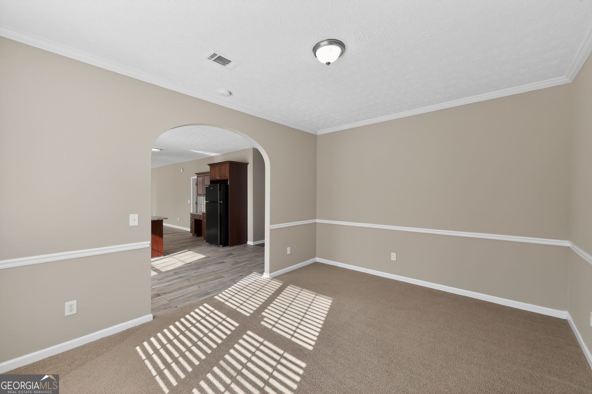 15 Parc Lane Covington, GA 30016 - Photo 11 of 30 a view of a room with wooden floor and furniture