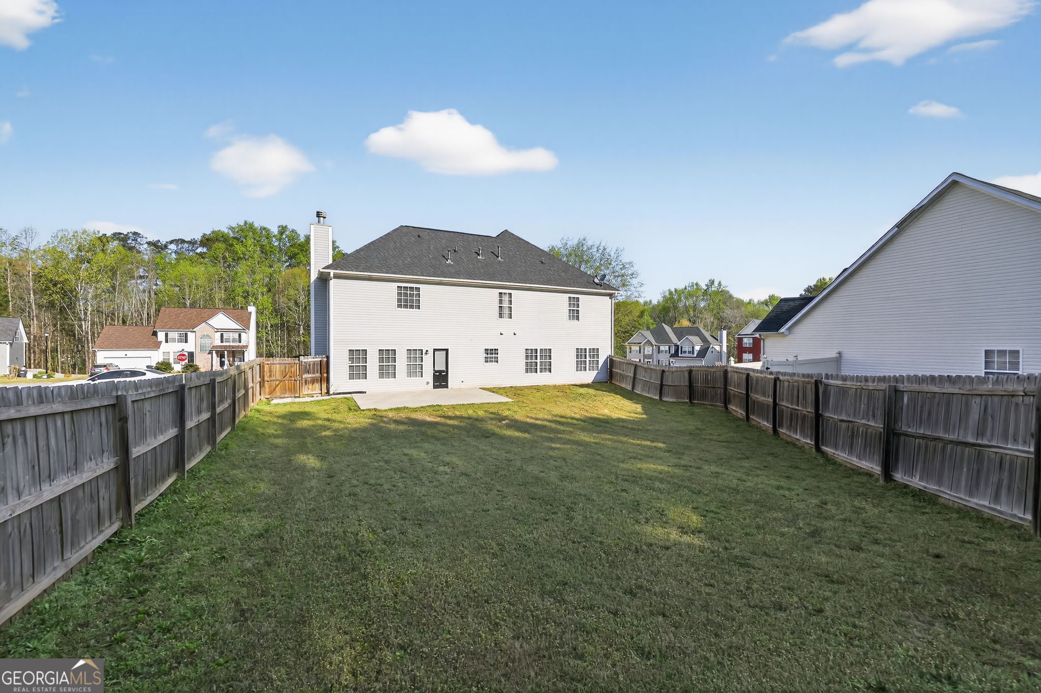 15 Parc Lane Covington, GA 30016 - Photo 30 of 30 a view of a house with a yard and sitting area