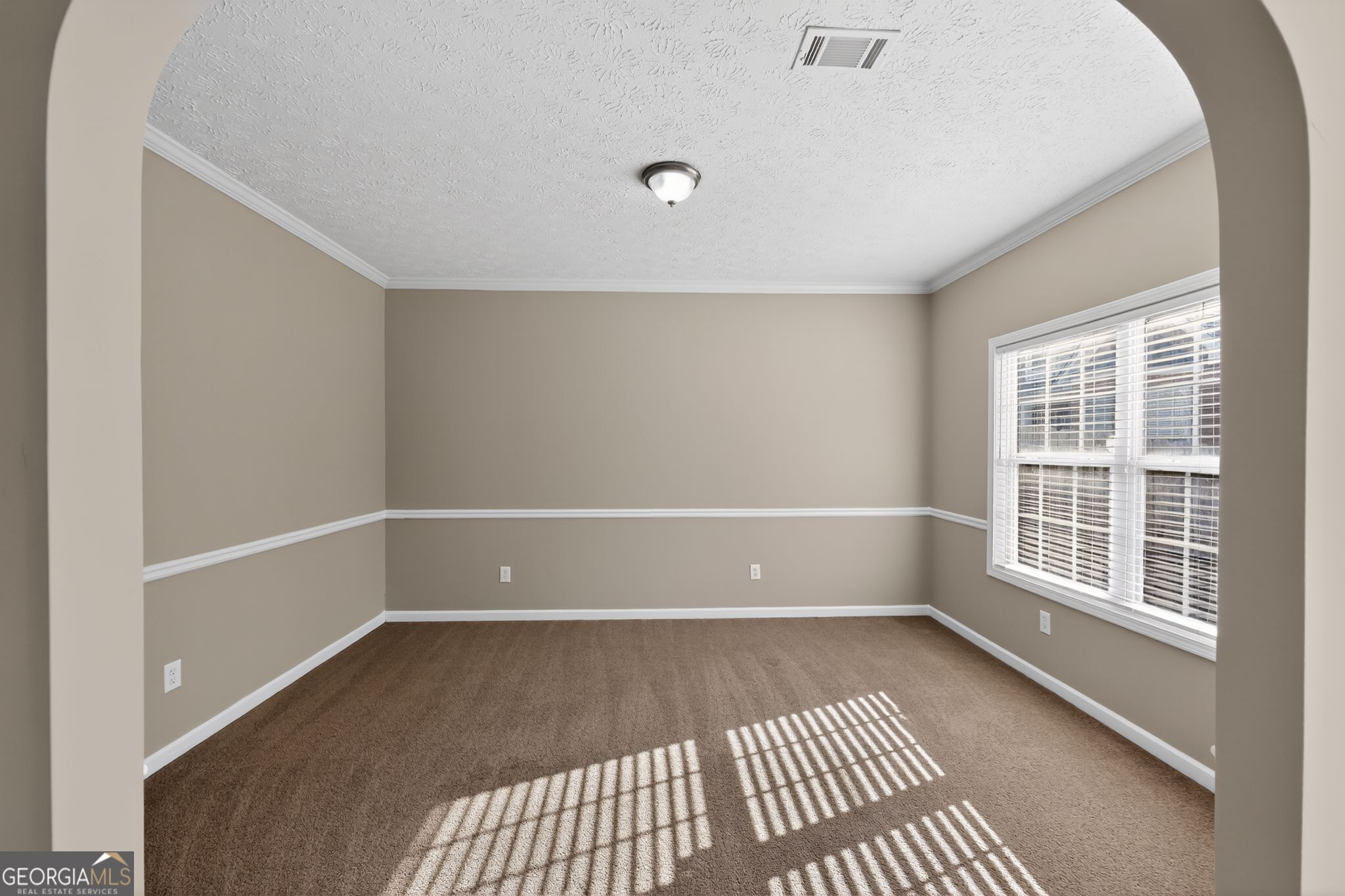 15 Parc Lane Covington, GA 30016 - Photo 6 of 30 a view of a room with window