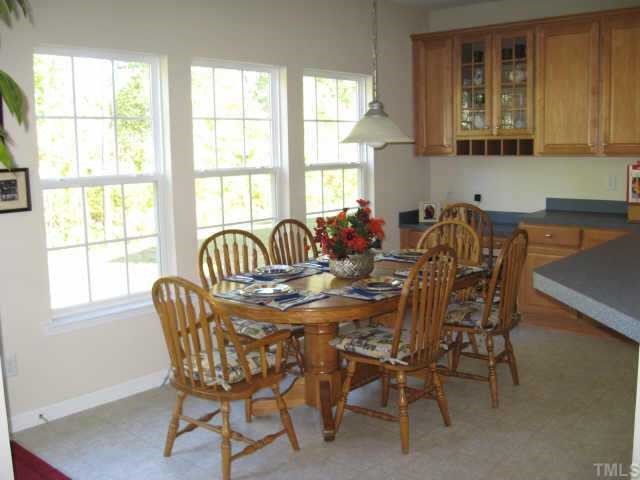 3521 Weir Way Raleigh, NC 27616 - Photo 6 of 12 a dining room with furniture and window